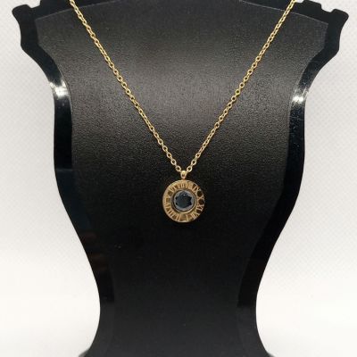 Gold Circle Pendant with Black Stone